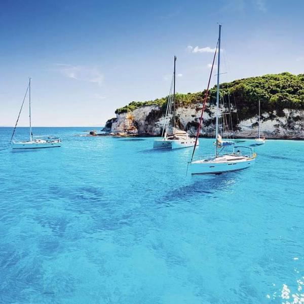 Book your Paxos and Antipaxos boat trip from Corfu today. Visit Blue Caves, swim in Antipaxos and enjoy stunning island views. Limited seats available with free transfer included.