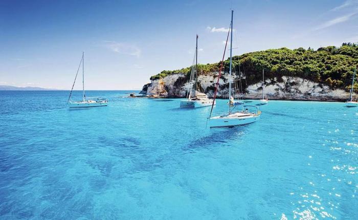 Book your Paxos and Antipaxos boat trip from Corfu today. Visit Blue Caves, swim in Antipaxos and enjoy stunning island views. Limited seats available with free transfer included.