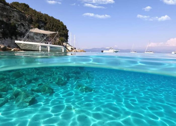 paxos antipaxos boat trip from corfu paxos island history antipaxos blue caves venetian sea routes ionian sea paxos olive groves history gaios village corfu excursion ionian islands maritime history blue caves paxos tour antipaxos turquoise waters corfu to paxos cruise ionian sea caves greece paxos travel guide historic sea routes greece venetian influence paxos greek island sailing history hidden caves paxos antipaxos swimming stop corfu island hopping cruise ancient maritime routes ionian islands paxos and antipaxos excursion ionian coast navigation paxos caves and grottos corfu boat excursions mediterranean island history gaios harbor history paxos island legends adriatic sea trade routes ionian island culture paxos day cruise from corfu corfu sea adventure tours