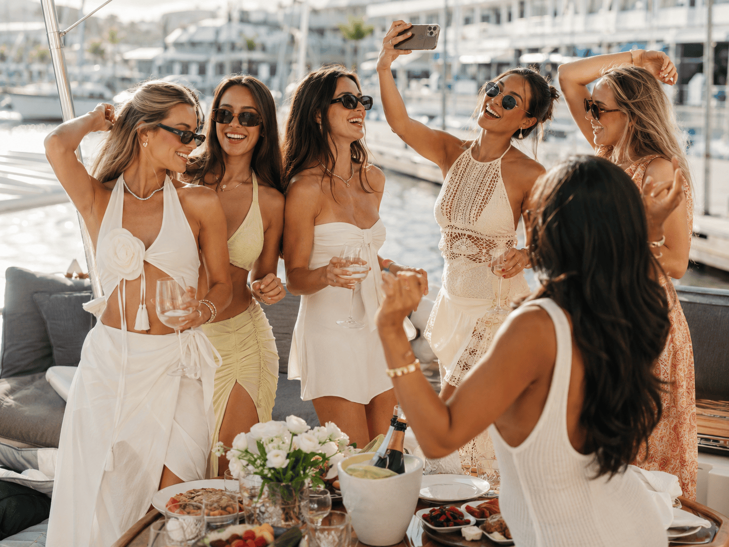 Friends enjoying music during a private Corfu boat party